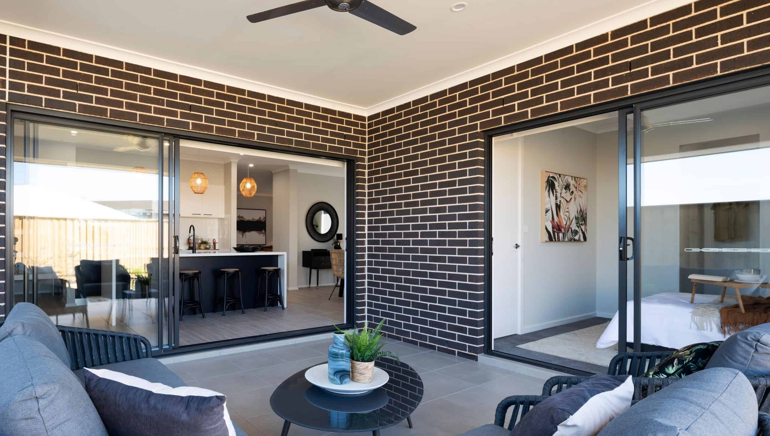 Empire tiled alfresco with ceiling fan indoor outdoor living Best Home Builders